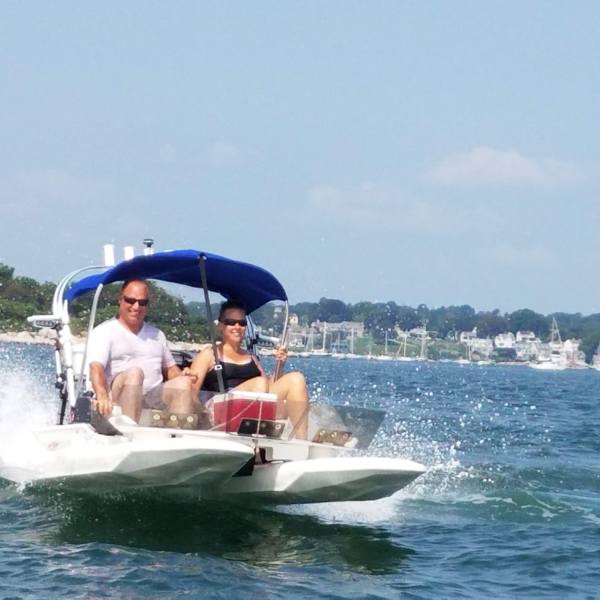Boaters driving small vessel